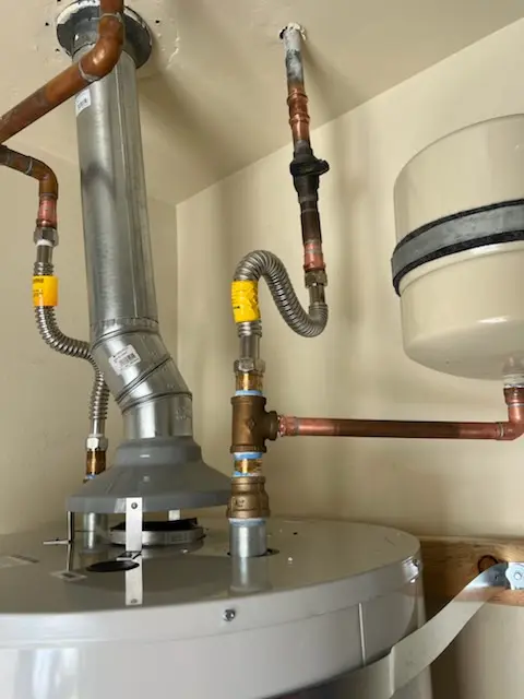 Water heater installation and plumbing repair in Pheasant Knoll